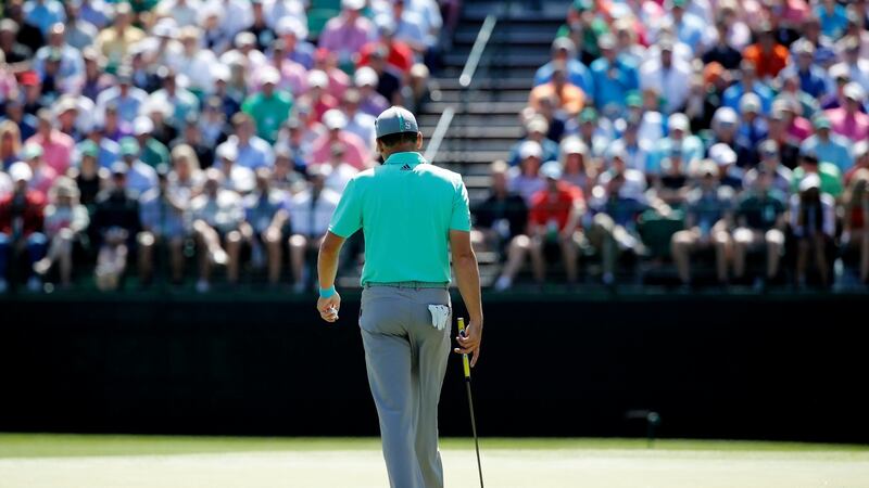 Sergio Garcia  walks off the 15th green after scoring 13 on the hole during the first round  of the 2018 Masters at the Augusta National Golf Club. Photograph:  Mike Segar/Reuters