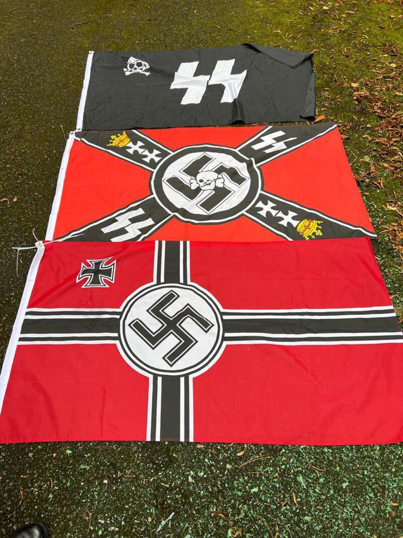 Flags bearing the SS and swastika symbols were pictured outside the Iqraa mosque in Belfast on Wednesday morning. Photograph: Pacemaker