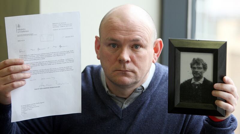 Charlie Agnew, nephew of John Pat Cunningham,  with a British ministry of defence  apology and a picture of his uncle. Photograph: PA Wire