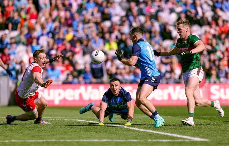 Cormac Costello sets up Colm Basquel to score his and Dublin's second goal against Mayo. Photograph: John McVitty/Inpho