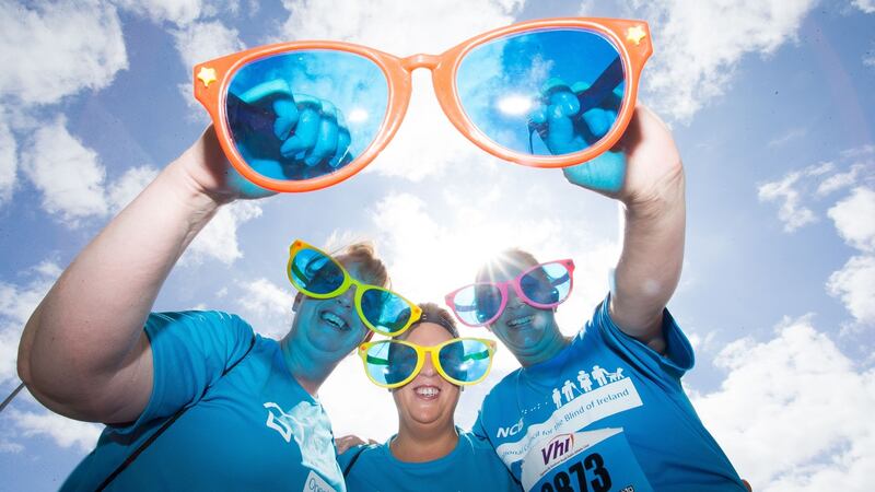 Sandra Lennon, Patricia Leonard and Emma Redmond, all from Arklow, Co Wicklow, at the VHI Women’s Mini Marathon. Photograph: Tom Honan