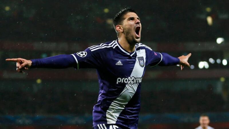 Anderlecht’s Aleksandar Mitrovic celebrates after scoring his team’s third goal against Arsenal   at the Emirates Stadium in London. Photograph: Stefan Wermuth / Reuters