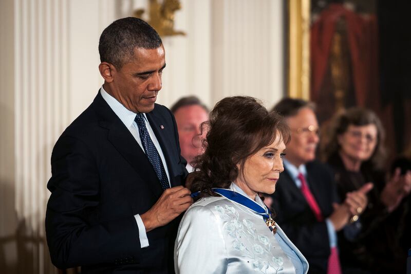 Loretta Lynn is presented with the Presidential Medal of Freedom by US president Barack Obama at the White House in Washington DC on November 20, 2013. Photograph: Gabriella Demczuk/New York Times