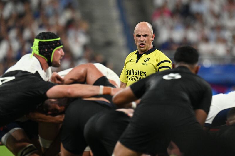South African referee Jaco Peyper looks over a scrum during the opening Rugby World Cup game between France v New Zealand in Saint-Denis, Paris. Photograph: Martin Bureau/AFP/via Getty Images