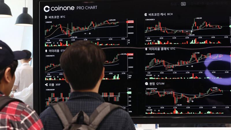 An electronic signboard shows the trading information of six cryptocurrencies at Coinone Blocks, an offline exchange in Seoul, South Africa. Photograph: Yonhap/EPA