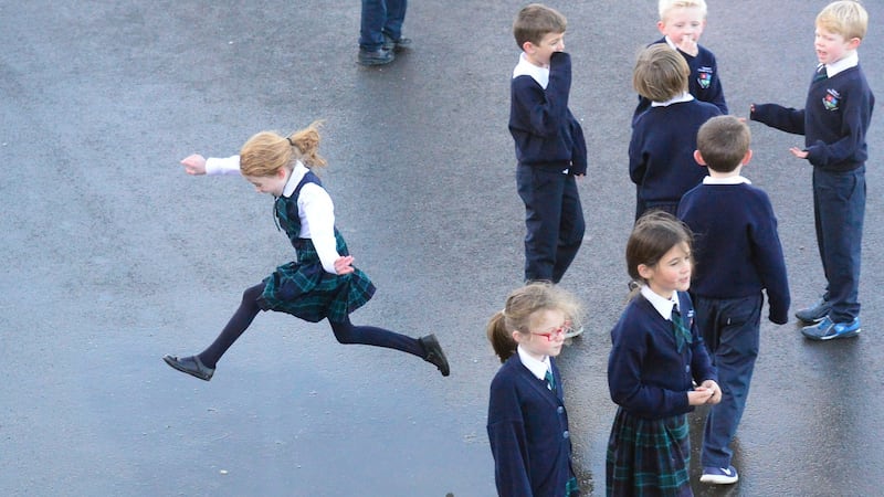 Pupils at Gaelscoil Thaobh na Coille, Stepaside during a break. Photograph: Cyril Byrne/The Irish Times