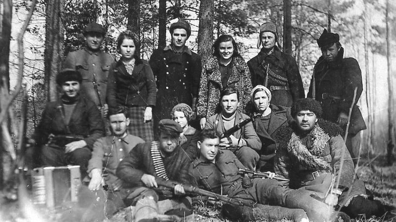 An undated photograph by Faye Schulman of herself, third from right in back row, with fellow partisans. Photograph: Faye Schulman