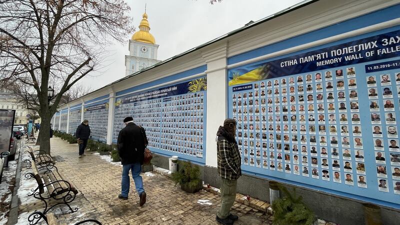 The so-called memory wall at St Michael’s monastery in central Kyiv, which carries photos of thousands of people killed in fighting between government forces and Russian-led separatists in eastern Ukraine