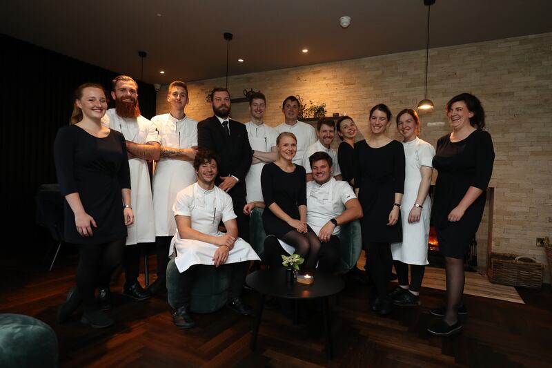 Aimsir: Front: Tom Downes, Jordan Bailey and Majken Bech-Bailey. Back: Roisin Lande, Andy Roche, Irad Jusic, Martin Cooper, Lewis Vimpany, James Bevan, Tim Davies, Ewa Cios, Catherine Steunenberg, Roisin O'Connor and Rose O Toole. Photograph: Nick Bradshaw