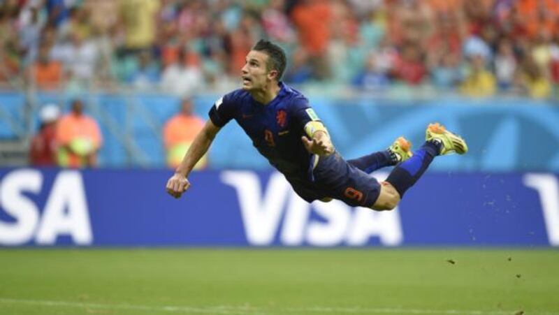 Robin van Persie leaps to head home the first Dutch goal against Spain at Arena Fonte Nova in Salvador, Brazil. Photograph: Getty Images