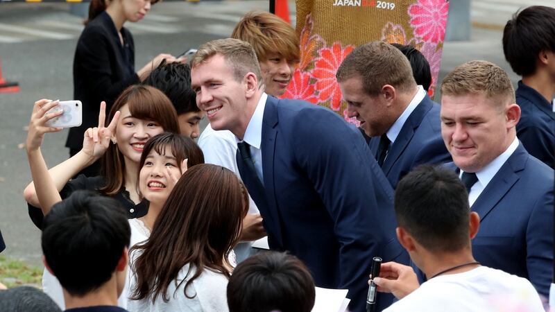 Chris Farrell takes a picture with fans before the opening ceremony in Tokyo. Photograph: Dan Sheridan/INPHO