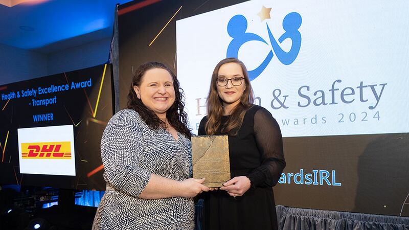Alison Connolly, awards judge, presents the health & safety excellence award – transport to Klaudia Kornacka, DHL Express Ireland