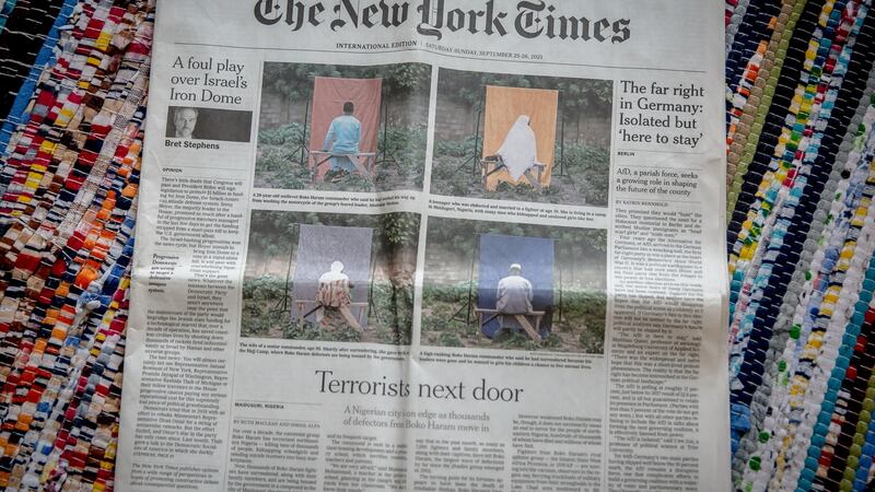 A front page New York Times story by Nigerian photojournalist Tom Saater.