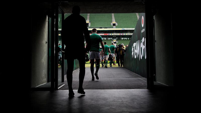 Players make their way for the team photo. Photograph: Tommy Dickson/Inpho