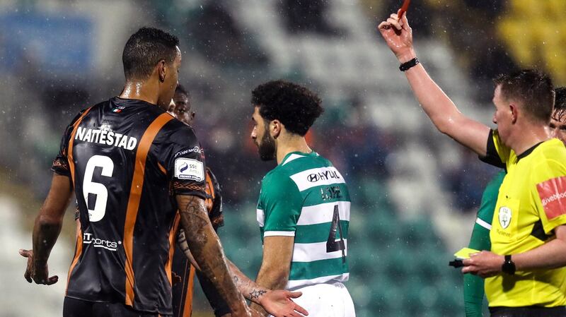 Dundalk’s Sonni Nattestad is sent off by referee Damien McGrath after a tackle on Graham Burke. Photograph: Ryan Byrne/Inpho