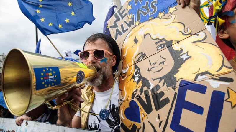 A protester chants and holds a placard as thousands march to Parliament Square in support of the European Union. Photograph: Jack Taylor/Getty Images