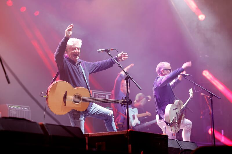 Lead singer Davy Carton  and the Saw Doctors on the Electric Arena stage on Sunday. Photograph: Alan Betson/The Irish Times

