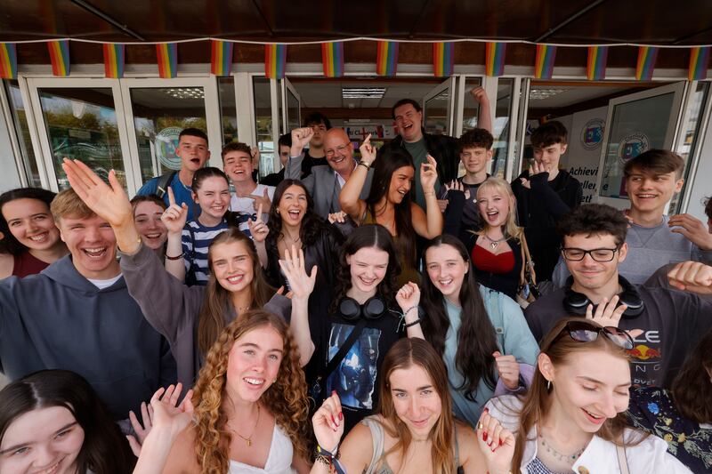  Principal Anthony Creevey with Leaving Cert Students from Clonturk Community College, Whitehall, Dublin after receiving their results on Friday. Photograph: Alan Betson