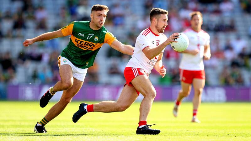 Tyrone’s Niall Sludden  gets away from Kerry’s Adrian Spillane during the All-Ireland semi-final at Croke Park. Photograph: Ryan Byrne/Inpho