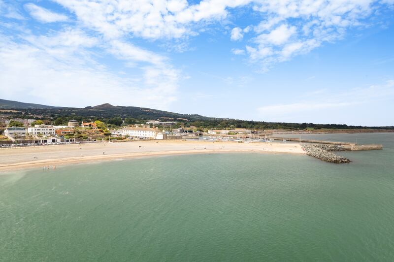 The property is adjacent to the beach in Bray