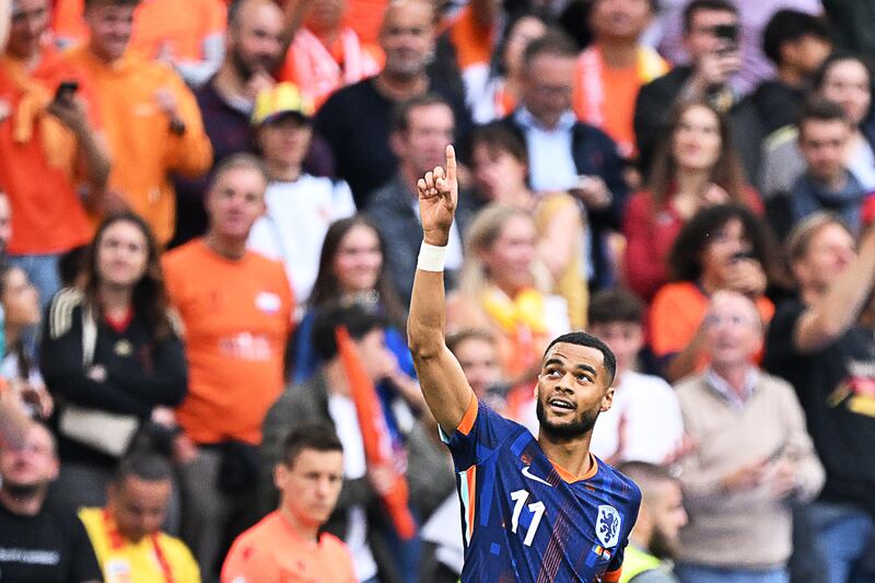 Cody Gakpo celebrates scoring his goal against Romania in Munich. Photograph: Kirill Kudryavtsev/AFP via Getty Images