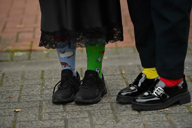 Mourners wore odd-coloured socks, as requested by the extended family, to the funeral of Mark O'Connor, Louise Doherty O'Connor and their son Evan, at St Patrick's Cathedral in Dundalk. Photograph: Mark Marlow/PA Wire