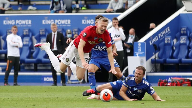 Leicester City’s Jonny Evans challenges Manchester United’s Scott McTominay for which he receives a red card. Photograph: PA