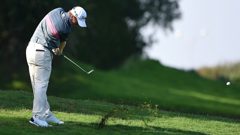 Gavin Moynihan takes a shot from the first fairway on day two of the NBO Golf Classic Grand Final - European Challenge Tour at Al Mouj Golf in Muscat, Oman. Photo: Tom Dulat/Getty Images