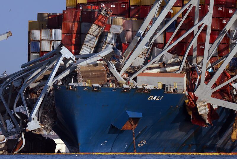 Crushed shipping containers on the bow of the Dali after it struck the Francis Scott Key Bridge in Baltimore. Photograph: Kevin Dietsch/Getty Images