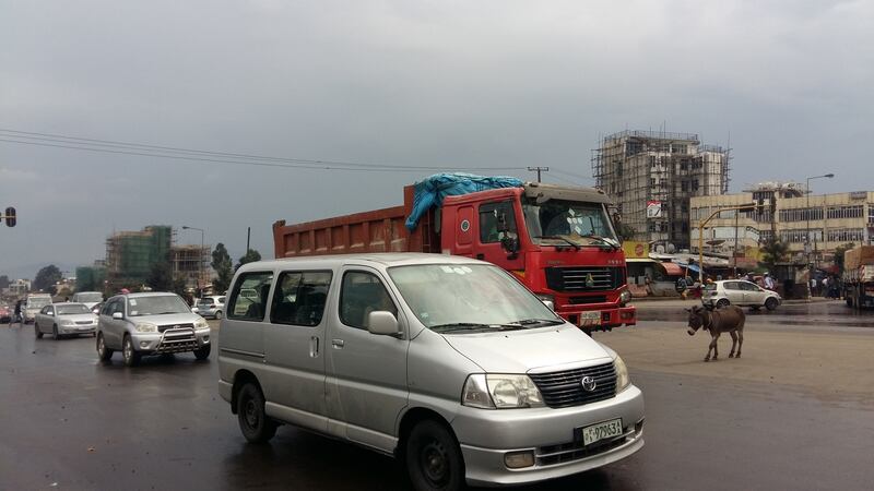 Hiace vans vie for road space with donkeys and tuk tuks.