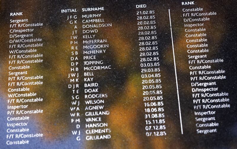 Names of RUC officers killed during the Troubles carved on one of the marble tablets in the RUC Memorial Garden