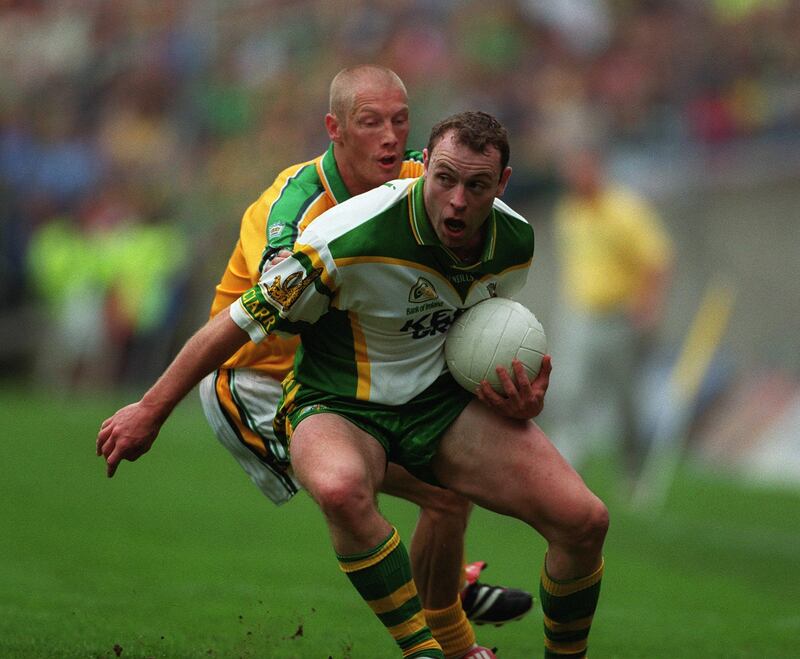 Graham Geraghty of Meath tackles Séamus Moynihan of Kerry during a 2001 encounter. Photograph: Andrew Paton/Inpho

