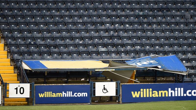 A general view of the damaged disabled enclosure after Rangers fans stood on the roof of it. Photograph: PA