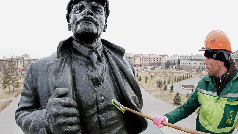 Statue of the Vladimir Lenin: His body is in a mausoleum on Red Square in Moscow. Photograph: Ilya Naymushin/Reuters