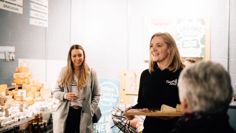 Taste and Tour co-founder Caroline Wilson conducting a food tour in Belfast: the company has added three new itineraries for 2020