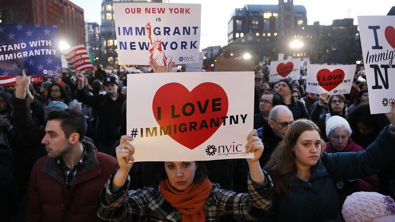 Hundreds of people attend an evening rally at Washington Square Park in New York in support of Muslims, immigrants and against the building of a wall along the Mexican border. Photograph: Spencer Platt/Getty Images