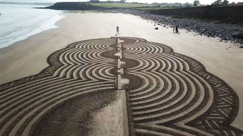 'I prefer to draw on remote beaches for the simple reason that I have peace. It’s a big concentration game.' Drone photograph: Manuel Frölich 