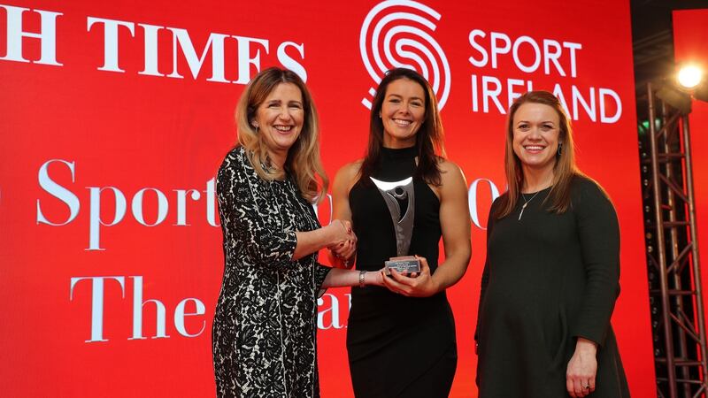 Canoeist Jenny Egan receives her monthly award for may from Deirdre Veldon, deputy editor of The Irish Times, and Lynne Cantwell, chair of Sport Ireland’s Women in Sport committee. Photograph: Nick Bradshaw