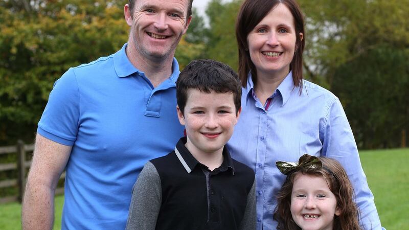 Mickey McNulty,  of Gortin, Omagh, Co Tyrone,  with   wife Moira,  son John and daughter Annie. Photograph: Lorcan Doherty