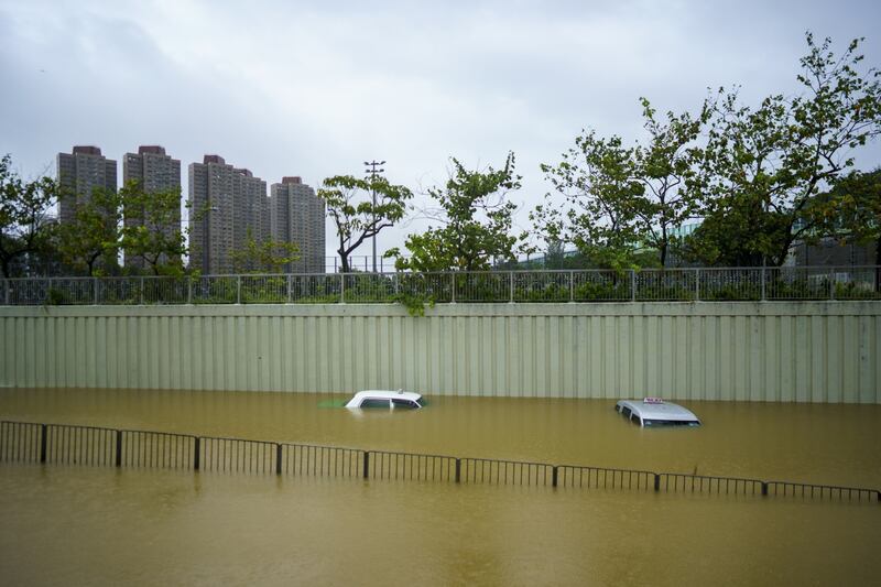 Taxis submerged in floodwater during heavy rain in Hong Kong. Photograph: Justin Chin/Bloomberg