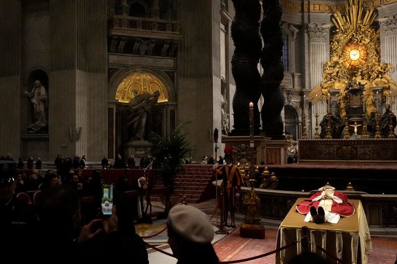 Mourners view the body of Emeritus Pope Benedict XVI. Photograph: Gregorio Borgia/AP