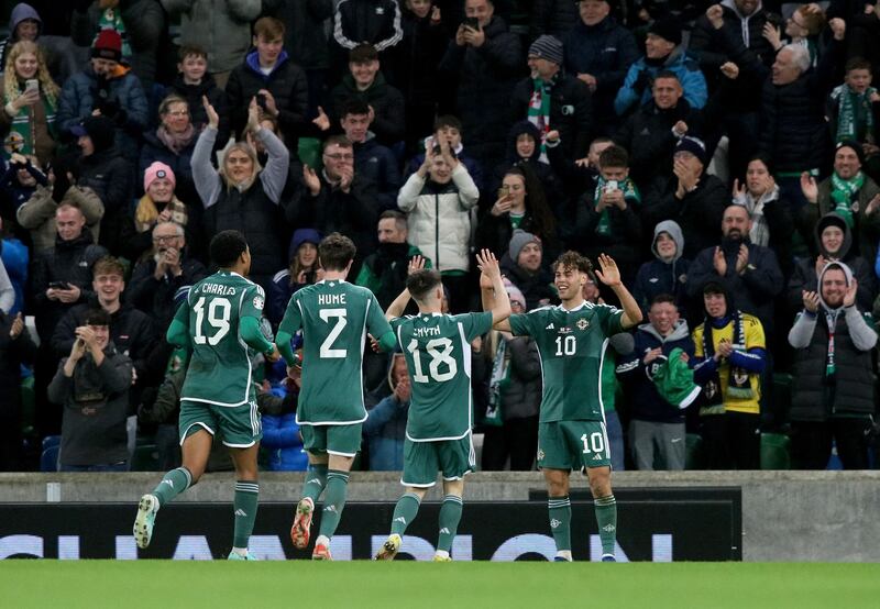 Northern Ireland's striker Dion Charles celebrates scoring against Denmark. Photograph: Paul Faith / AFP via Getty Images 