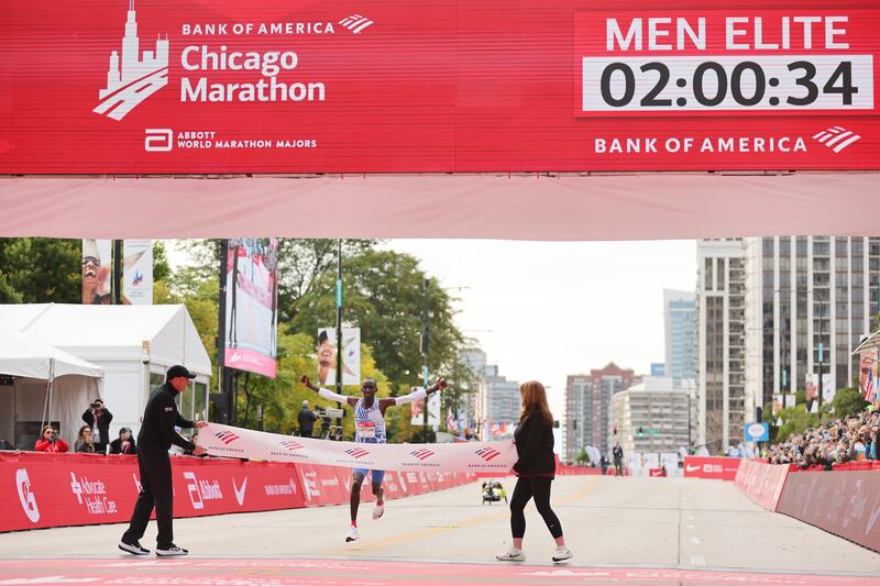 Kelvin Kiptum celebrates as he crosses the finish line last October to win the 2023 Chicago Marathon in a new world record marathon time of 2:00.35. Photograph: Michael Reaves/Getty Images