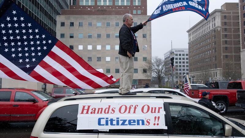Supporters of the Michigan Conservative Coalition protest against the state’s extended stay-at-home order. Photograph: REUTERS/Seth Herald