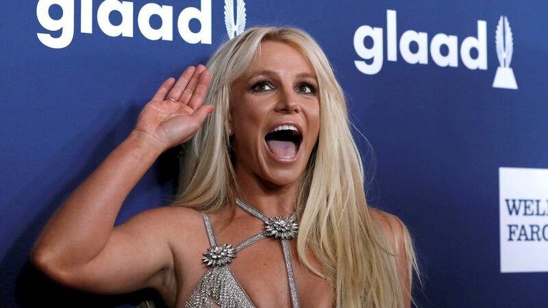 Britney Spears’s new book, The Woman in Me, goes beyond the harrowing conditions of the last decade because her mistreatment started long before that. Photograph: Reuters