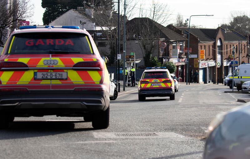 Gardai at the funeral of Tristan Sherry who died during a botched gun attack in a restaurant in Blanchardstown on Christmas eve are taken into St, Canice's Church, Finglas. Photograph: Colin Keegan, Collins Dublin