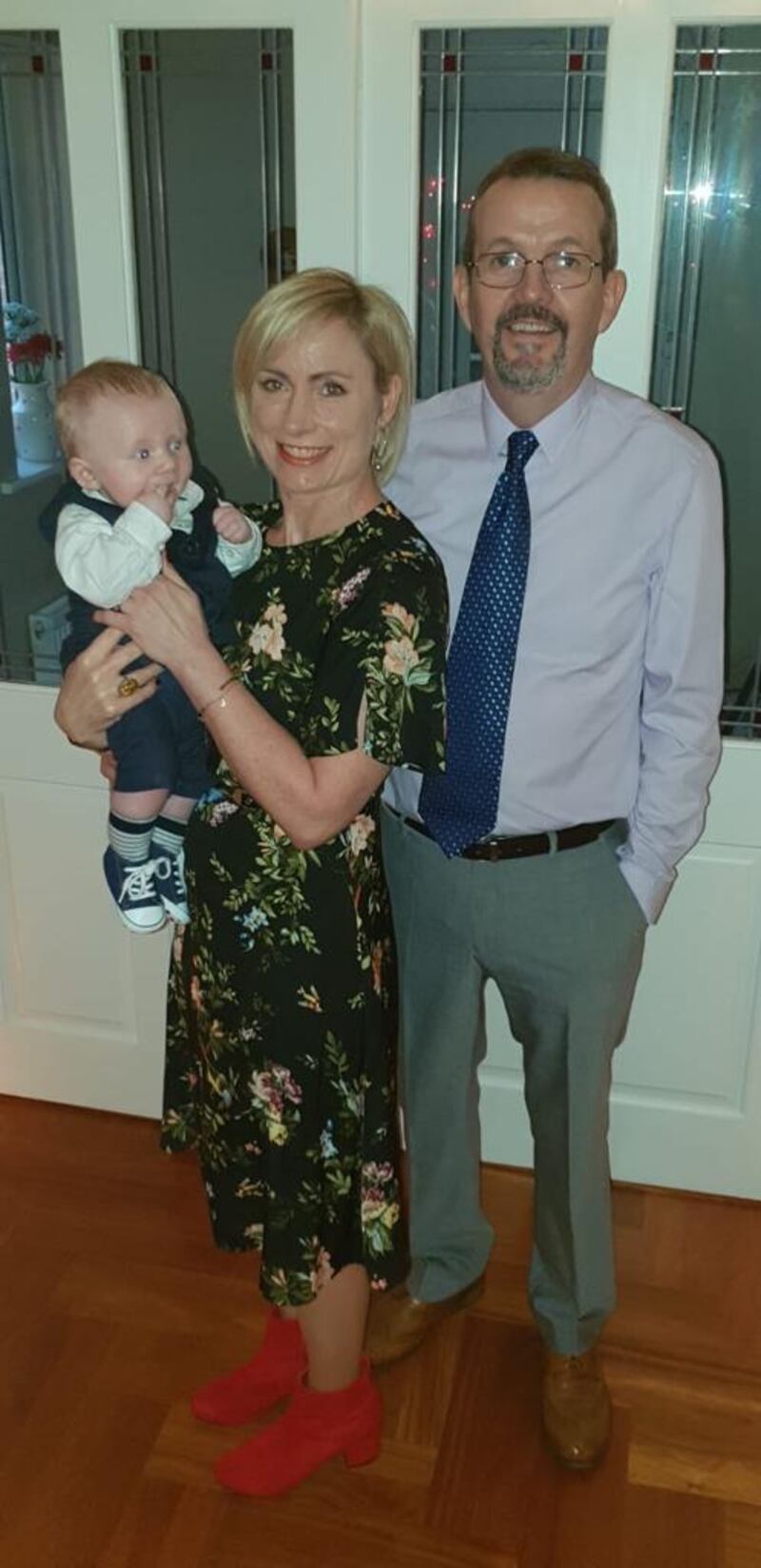 Caleb on his Christening day with Cliodna and Enda.