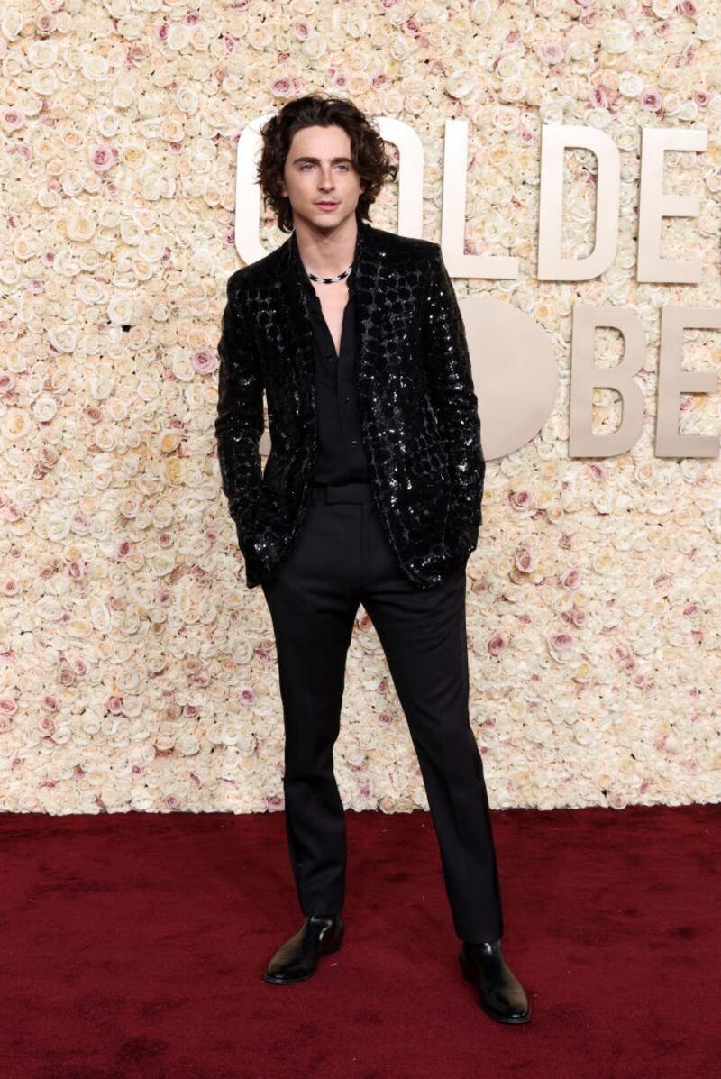 Timothée Chalamet in a sparkly black Celine Homme blazer. Photograph: Amy Sussman/Getty Images