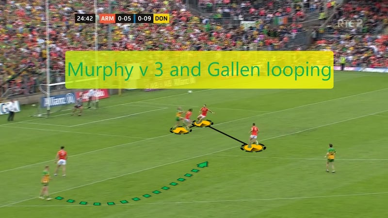 Murphy wins aerial battle despite being outnumbered after quick ball fired in after securing Armagh kickout