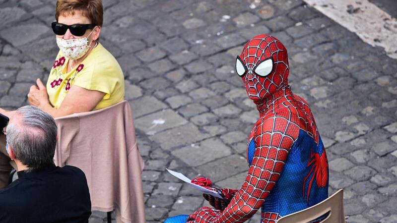 Mattia Villardita wearing a Spider-Man costume waiting for the Pope’s arrival at San Damaso courtyard in the Vatican. Photograph: Alberto Pizzoli/AFP via Getty